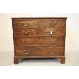 A GEORGIAN MAHOGANY CHEST, c.1760, the moulded edged top over two short and three long cockbeaded