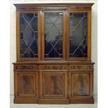 AN EDWARDIAN MAHOGANY LIBRARY TWO STAGE BOOKCASE, crossbanded with stringing, moulded and key inlaid