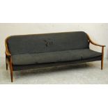 A GREAVES & THOMAS 1960'S ORGANIC FORM SOFA BED, the teak frame upholstered in a charcoal grey weave