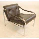 A PIEFF ARMCHAIR, 1960's, in chrome and brown leather, the tubular frame with down curved leather