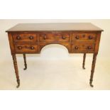 A REGENCY MAHOGANY DRESSING TABLE, the reeded edged top over central frieze drawer and kneehole