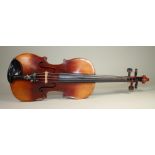 A GERMAN "MAGGINI" VIOLIN, c.1880, with 358mm two piece back, stamped "Paganini" below button,