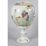 A CHINESE PORCELAIN HURRICANE LAMP, the ovoid shade painted in pastel shades with five ladies in a