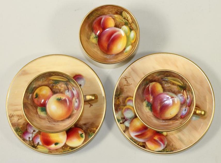 A PAIR OF ROYAL WORCESTER CHINA MINIATURE TEACUPS AND SAUCERS, modern, all over painted in