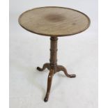 A MAHOGANY TRIPOD TABLE, 18th century and later, the associated dished circular tip up top on ring