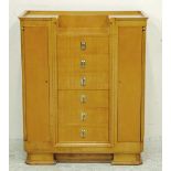 A GENTLEMAN'S ART DECO SATINWOOD DRESSING CHEST, the inset top with moulded cornice and recessed