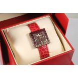 "BE MAD" - a Chopard limited edition quartz wristwatch, the chequered square red resin dial inset