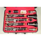 A PAIR OF BOOSEY & HAWKES "EMPEROR" CLARINETS, with silver plated keys and mounts, numbered 485978