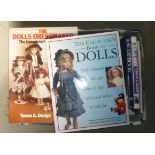 Nine books on dolls and a quantity of Dolls Collectors News and other magazines