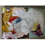 A large quantity of dolls clothing in cotton, wool, silk and lace