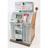 A Jennings "Governor" fruit machine with chromium plated metal and wood case, manual lever action,