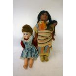 A French style bisque head doll with fixed blue glass eyes, open mouth and teeth, pierced ears,