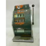 A Mills One Armed Bandit with "Mystery Bonus Payout", manually operated, with cast iron case,