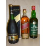 One bottle Remy Martin V.S.O.P. Cognac, boxed, one old bottle Johnny Walker Red Label Old Scotch,