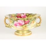A ROYAL WORCESTER CHINA ROSE BOWL, 1912, of squat baluster form with everted scalloped rim, two