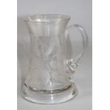 A GEORGIAN GLASS ALE MUG, c.1800, of waisted cylindrical form, with applied multi-reeded band, drawn