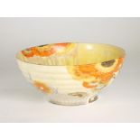 A CLARICE CLIFF WILKINSON POTTERY BIZARRE BOWL, 1930's, of flared ribbed circular form, painted in