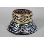 A LOETZ STYLE IRIDESCENT GLASS FLOWER HOLDER, early 20th century, of tapering cylindrical form