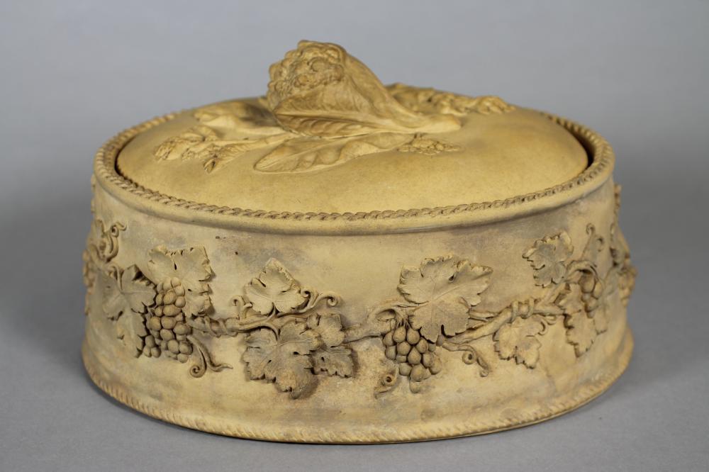 A VICTORIAN WEDGWOOD CANEWARE PIE DISH AND COVER, of typical form, the cover moulded and applied