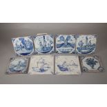 A SET OF FOUR DUTCH DELFT TILES, 18th century, painted in blue with religious figures, together with