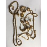 An assortment of 9ct gold including neck chains and earrings approximate weight 31.8gms.