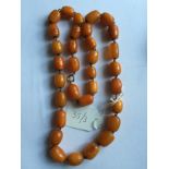 Butterscotch amber necklace, 53.2gms. Approx. 60cms long.