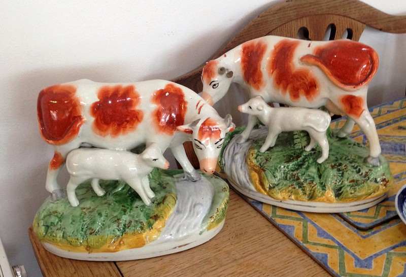 Two Staffordshire cow and calf figures, a/f.