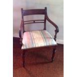 Good quality Regency elbow chair.