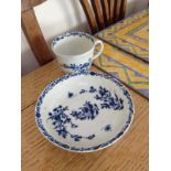 Small blue and white cup and saucer probably worcester with workman's marks.