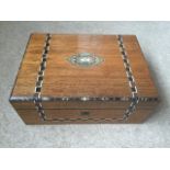A Victorian inlaid rosewood writing box inlaid in abalone, bone, ebony and German silver, the lid