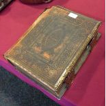 Browns Self Interpreting Bible with embossed covers in need of TLC.