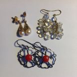 Three pairs of earrings inc. moonstone, pearl and silver