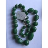 Jade necklace.