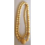 Ivory bead necklace approx. 80 cms long