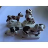 Four miniature 19th c ceramic dogs