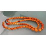 Two strings of butterscotch amber beads, 43.2gms.