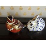 Two Royal Crown Derby paperweights with stoppers.