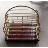 Brass and mahogany magazine rack.