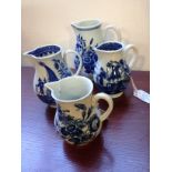 Four blue and white sparrow beak jugs (one cracked)