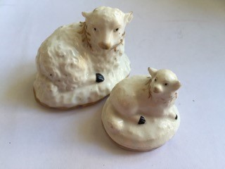 Two Rockingham porcelain sheep slight a/f incised 109 mark