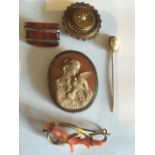 Six 19th c good quality brooches and a tie pin inc. coral, shell cameo, agate and paste