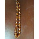 Amber and Pearl necklace, 70.4gms 56cms long approximately.