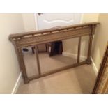 Regency gilt wood and gesso three panel overmantle mirror