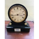 Early 19th century mahogany mantle clock with ivory disks.