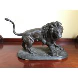 Good 19thC figure of a lion and serpent.