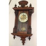 Edwardian walnut wall clock.