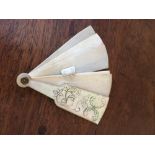Mother of pearl and bone dance card in the form of a miniature fan.