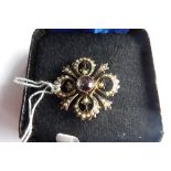 Nine carat gold seed pearl and amethyst brooch.