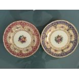 Pair Royal Worcester cabinet plates with hand painted floral centres one signed M Millward