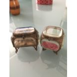 Two small gilt metal and glass trinket boxes